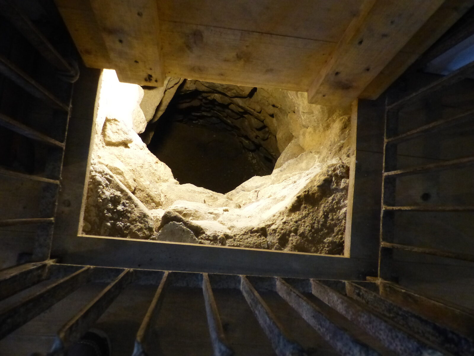 An Erdstall entrance opening from the dining room of a farmhouse at the Mittermayrhof open-air museum, Hellmonsödt, Upper Austria