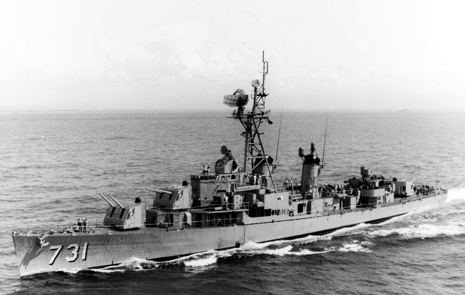 US Navy destroyer USS Maddox (DD-731) under way, port bow view, 1964
