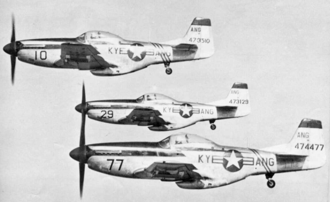 Three North American F-51D Mustang fighters of the Kentucky Air National Guard flying in formation