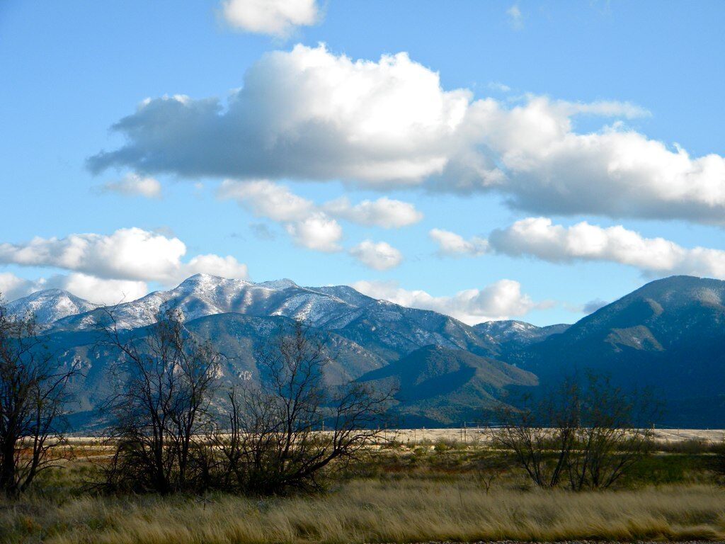 The Huachuca Mountains rising above open desert scrub in the San Pedro Valley, Cochise County, Arizona.